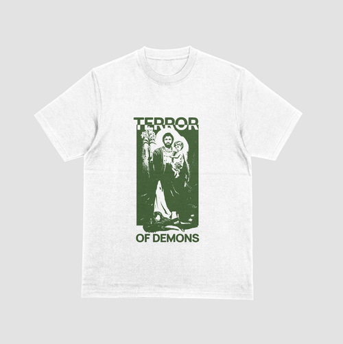 White t-shirt with green graphic and text 'Terror of Demons' on a gray background
